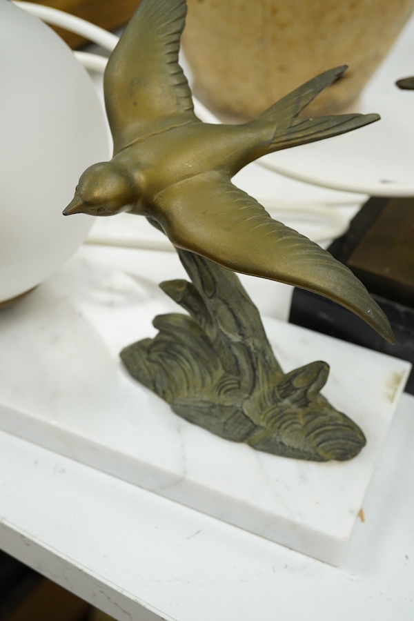 after Josef Lorenzl, a bronze model of Diana and a bronze ‘swallow’ lamp. Base signed H. Vriue